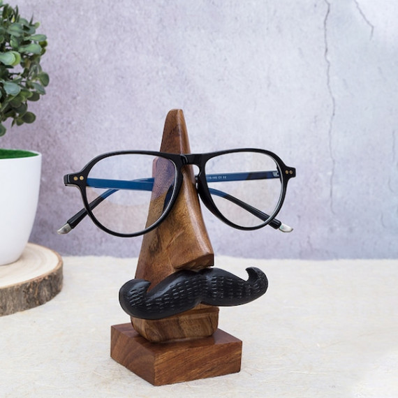 https://easyeleganz.com/products/brown-handcrafted-eyeglass-holder-showpiece